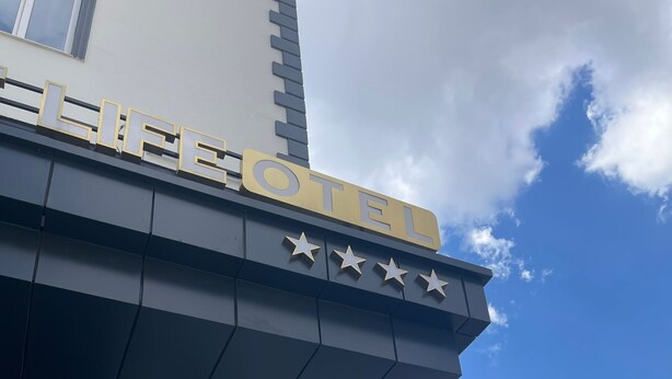 A hotel sign with the name "HOTEL" and four stars. - Zade Life OTEL (Gaziantep)