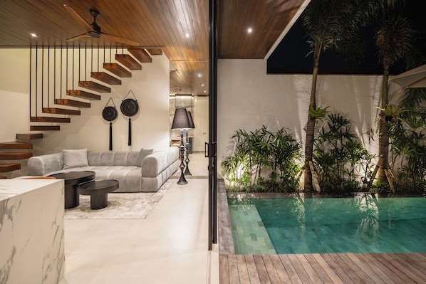 Deluxe Villa, 2 Bedrooms, Balcony, Pool View | Living area | 40-inch Smart TV with digital channels