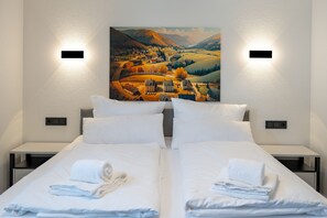 2 habitaciones, tabla de planchar con plancha, wifi y ropa de cama