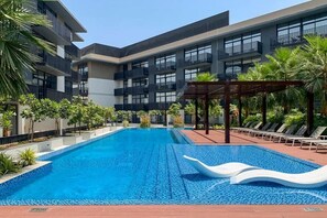 Outdoor pool - Manzil-1BR Apt with Pool in JVC (Dubai)