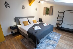 1 bedroom, desk, iron/ironing board, travel crib