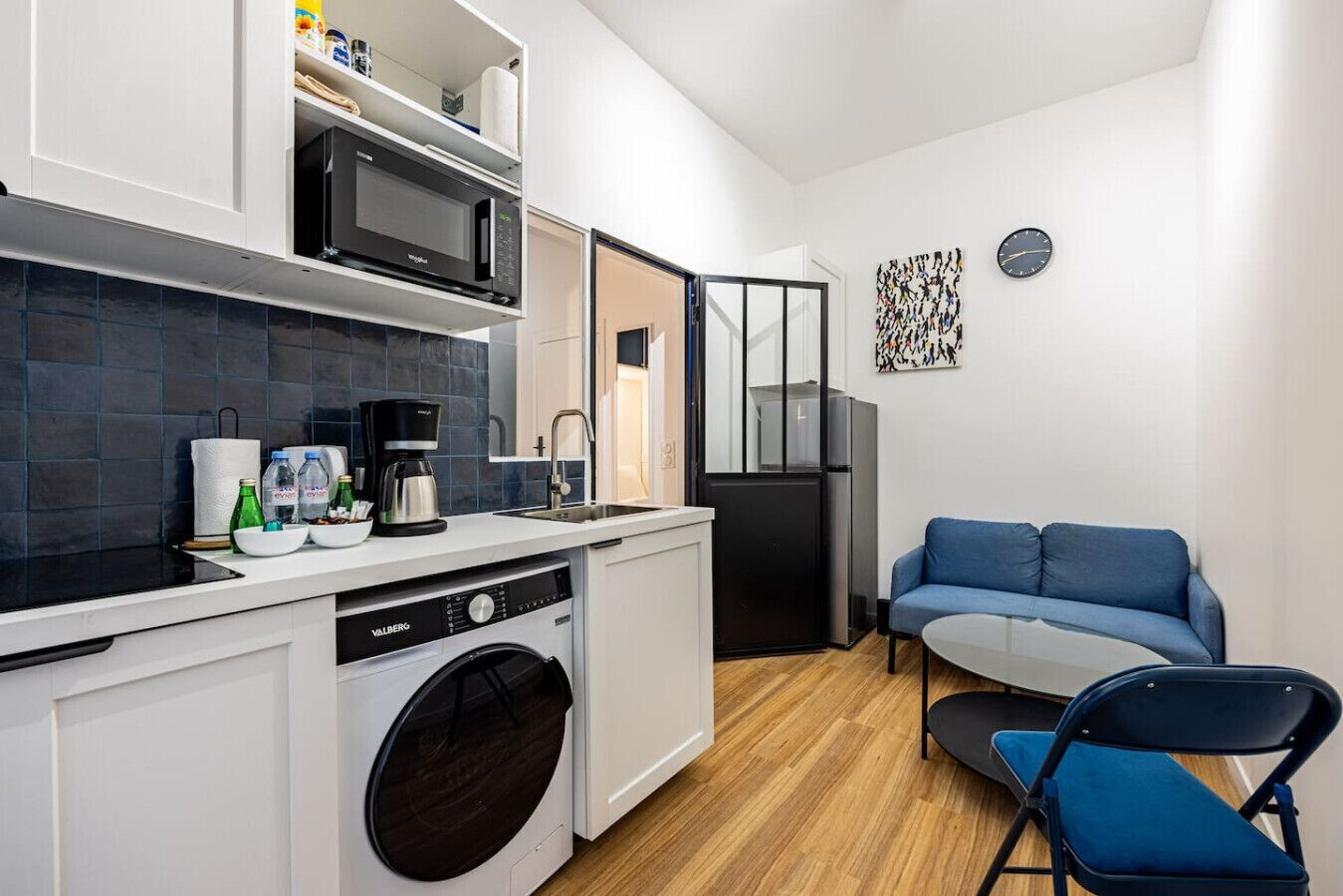 Fridge, microwave, coffee/tea maker, cookware/dishes/utensils