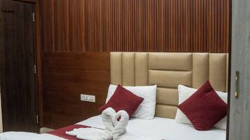 Deluxe Room, City View | In-room safe, desk, laptop workspace, soundproofing