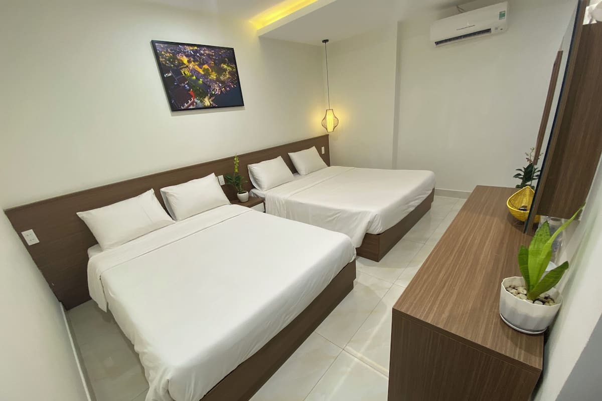 Family Quadruple Room | Desk, laptop workspace, iron/ironing board, free WiFi