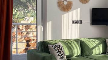 Apartemen Deluks, balkon, pemandangan laut | Area keluarga