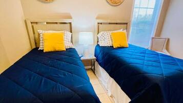 2 bedrooms, desk, iron/ironing board, travel crib