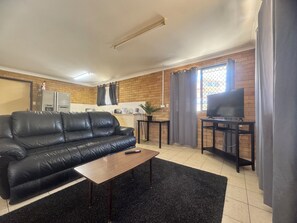 40-inch Smart TV with digital channels, Netflix, streaming services - Main Residences (Southport)