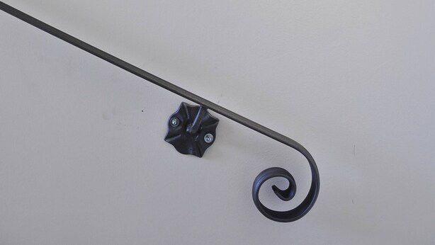 A metal fixture with a light on a white wall. - Modern Studio in the City Center (Split)