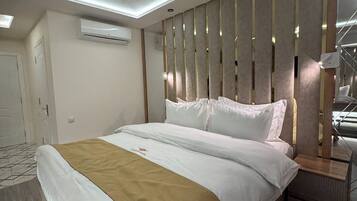 In-room safe, desk, laptop workspace, iron/ironing board
