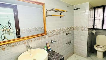 Shower, slippers, towels, soap