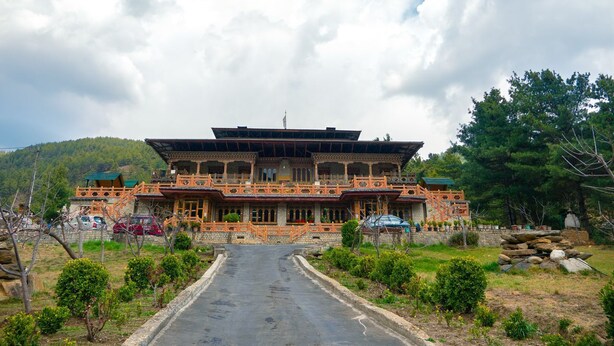 A traditional multi-story building with a prominent entrance and a balcony. - Hotel Jakar View (Bumthang)