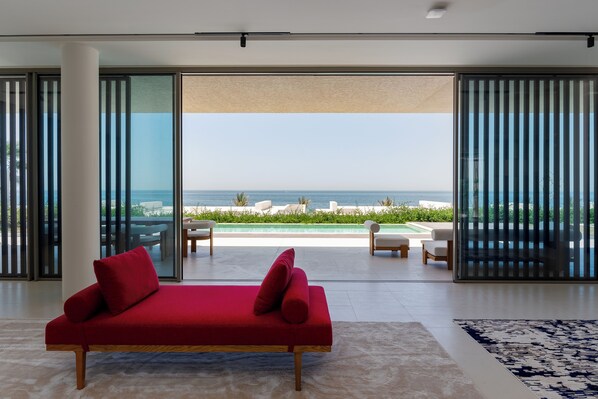 Panoramic Villa, 4 Bedrooms, Private Pool, Sea View | Living area | 65-inch Smart TV with digital channels - Al Zorah Villa - Mint Stay (Ajman)