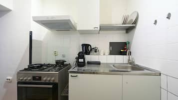 Fridge, stovetop, coffee/tea maker, cookware/dishes/utensils