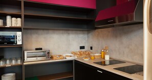 Desayuno de autoservicio (EUR 3.5 por persona)