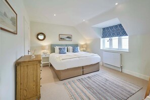 4 bedrooms, iron/ironing board, travel cot, WiFi