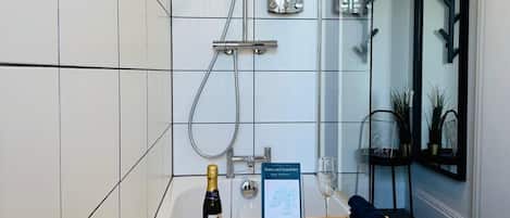 Hair dryer, towels, soap, shampoo