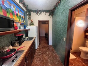 Fridge, microwave, stovetop, coffee/tea maker - TROPICAL BIRD ROOM - Close to Beach - One Bedroom Suite (San Pedro)
