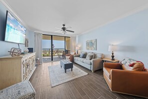 Signature Condo, 3 Bedrooms, Non Smoking, Beach View | Living room | 55-inch Smart TV with digital channels, DVD player - White Caps 102 (Orange Beach)