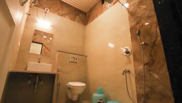 Triple Room | Bathroom | Shower, slippers, towels, soap