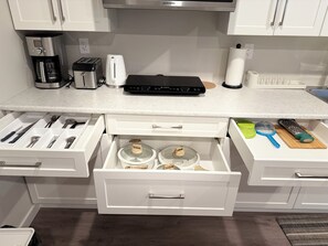 Fridge, microwave, stovetop, coffee/tea maker