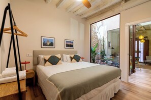 Design Apartment, Patio, Courtyard View | 1 bedroom, laptop workspace, blackout drapes, soundproofing