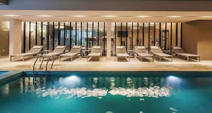 Departamento Premium a 2 minutos de la playa, piscina climatizada, spa, fitness