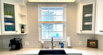 Charming Coastal Cape Cod w/ King Bed, Bikes, & Game Room near Downtown Beach