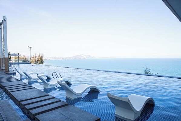 Indoor pool, 2 outdoor pools, pool umbrellas, sun loungers