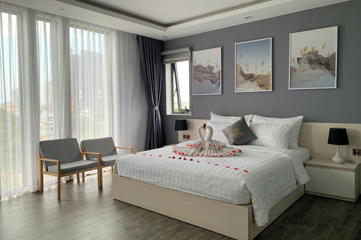Quarto luxo, vista para a cidade | Cortinas blackout, quartos à prova de som, ferros/tábuas de passar roupa