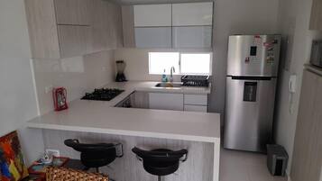 Fridge, microwave, oven, cookware/dishes/utensils