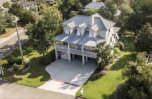 Welcome to 438 Cayman Loop,  stunning coastal getaway in the heart of SC beaches