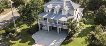 Welcome to 438 Cayman Loop,  stunning coastal getaway in the heart of SC beaches