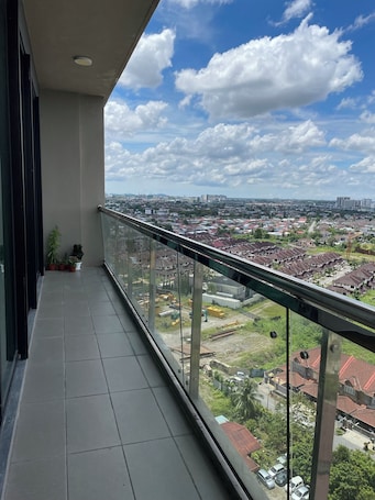 Property grounds. Spacious 3-bedroom apartment with AC, fitness room in charming Kuching