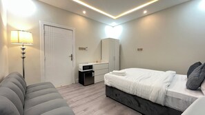 1 chambre, fer et planche Ă repasser, Wi-Fi, draps fournis