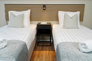 Laptop workspace, free WiFi, bed sheets