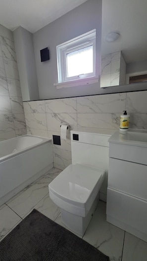 Hair dryer, towels, soap, toilet paper