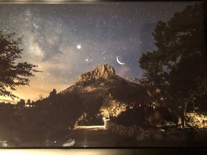 A mountain with a crescent moon and stars in the night sky. - Thumb Butte Chalet Nestled in the Mountains (Prescott)
