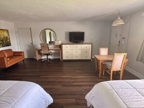 Deluxe Studio Suite, 2 Queen Beds | Living area | LED TV