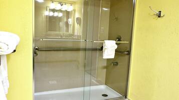 Combined shower/bathtub, hair dryer, towels, soap