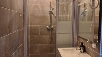 Hair dryer, towels, soap, toilet paper