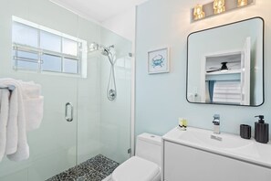 Shower, hair dryer, shampoo