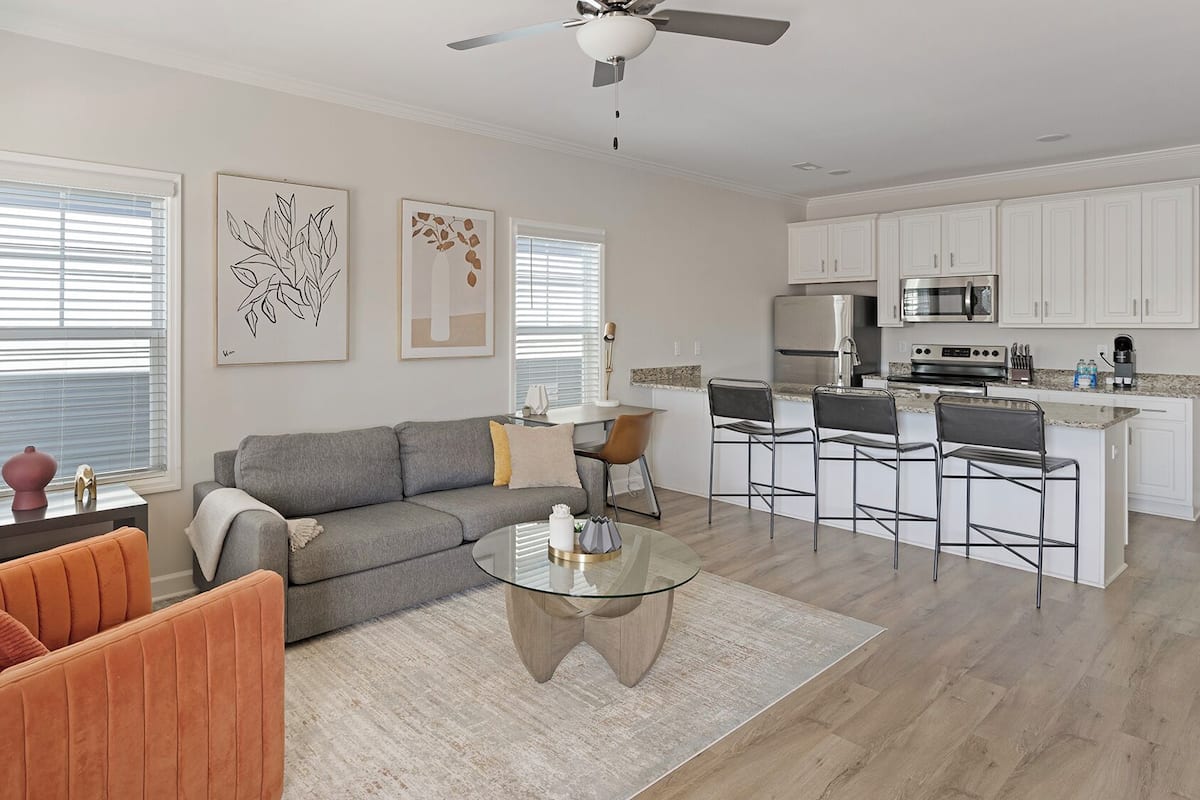 Apartment, 2 Bedrooms | Living area | 50-inch TV with digital channels