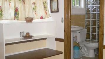 Shower, towels, soap, toilet paper