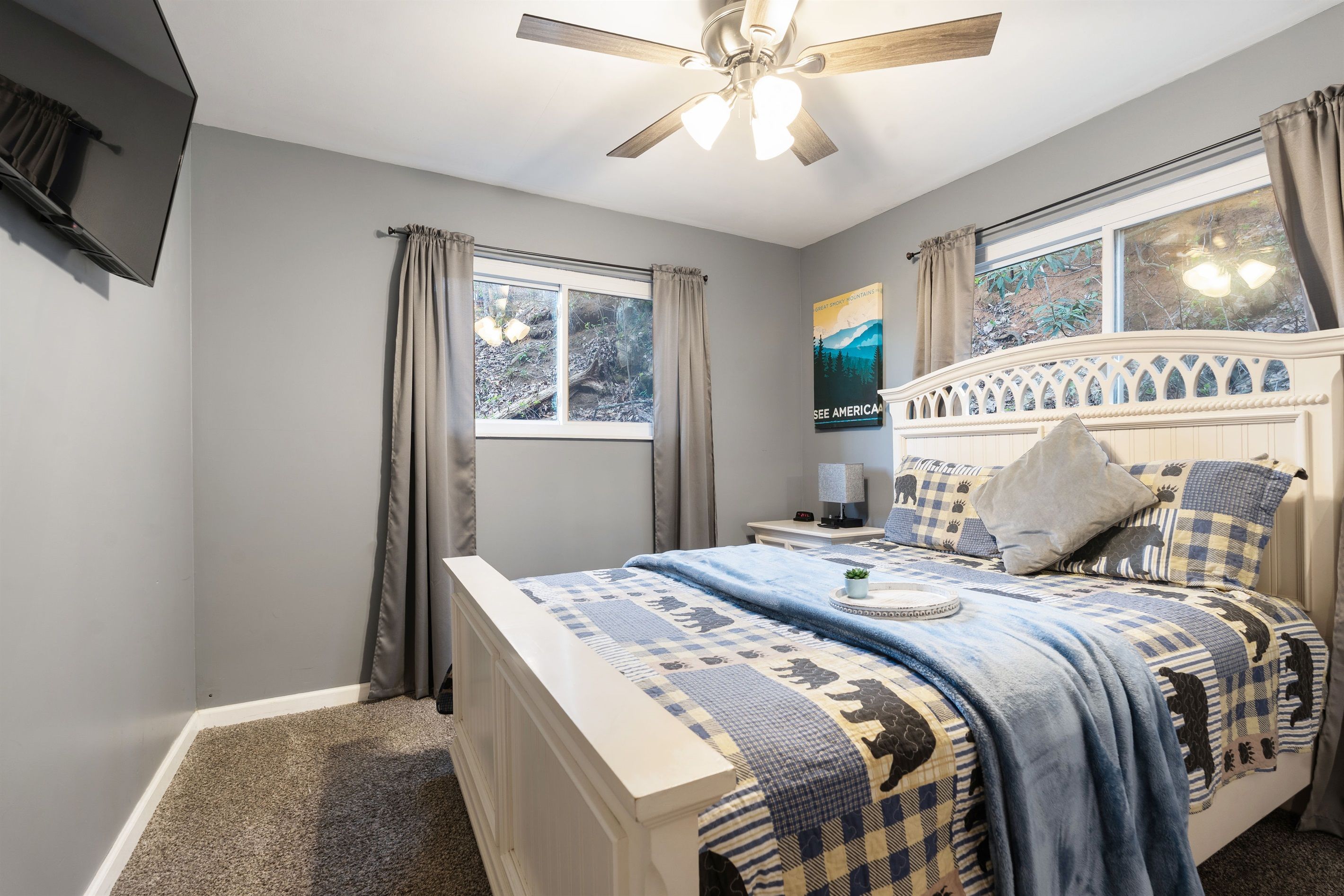 - A peaceful place to recharge—Downstairs Bedroom 2 features soft lighting, a comfy bed, and thoughtful touches for a relaxing stay
