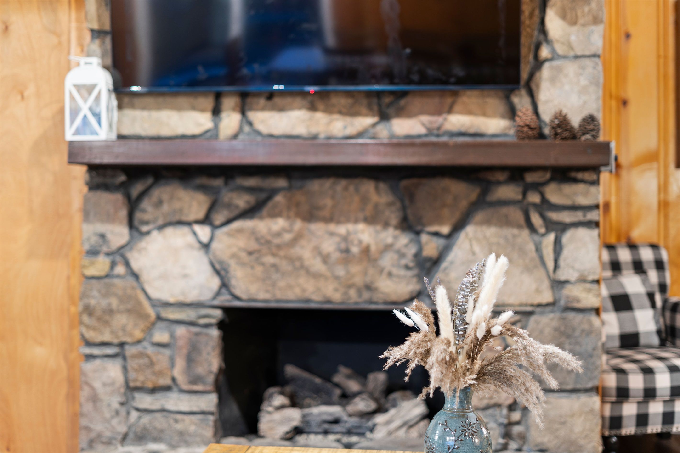 The heart of the cabin—this inviting fireplace brings warmth, comfort, and a touch of Smoky Mountain magic