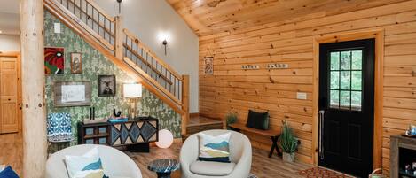 Smart TV, fireplace, table football, books