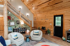 Smart TV, fireplace, table football, books