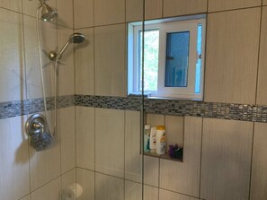 Shower, hair dryer, towels, soap