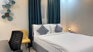 1 chambre, fer et planche à repasser, Wi-Fi, draps fournis