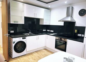 Apartment | Private kitchen | Full-size fridge, microwave, oven, stovetop